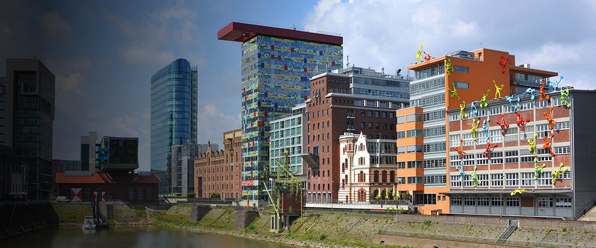 Colorful modern buildings along the waterfront in Media Harbor, Düsseldorf.